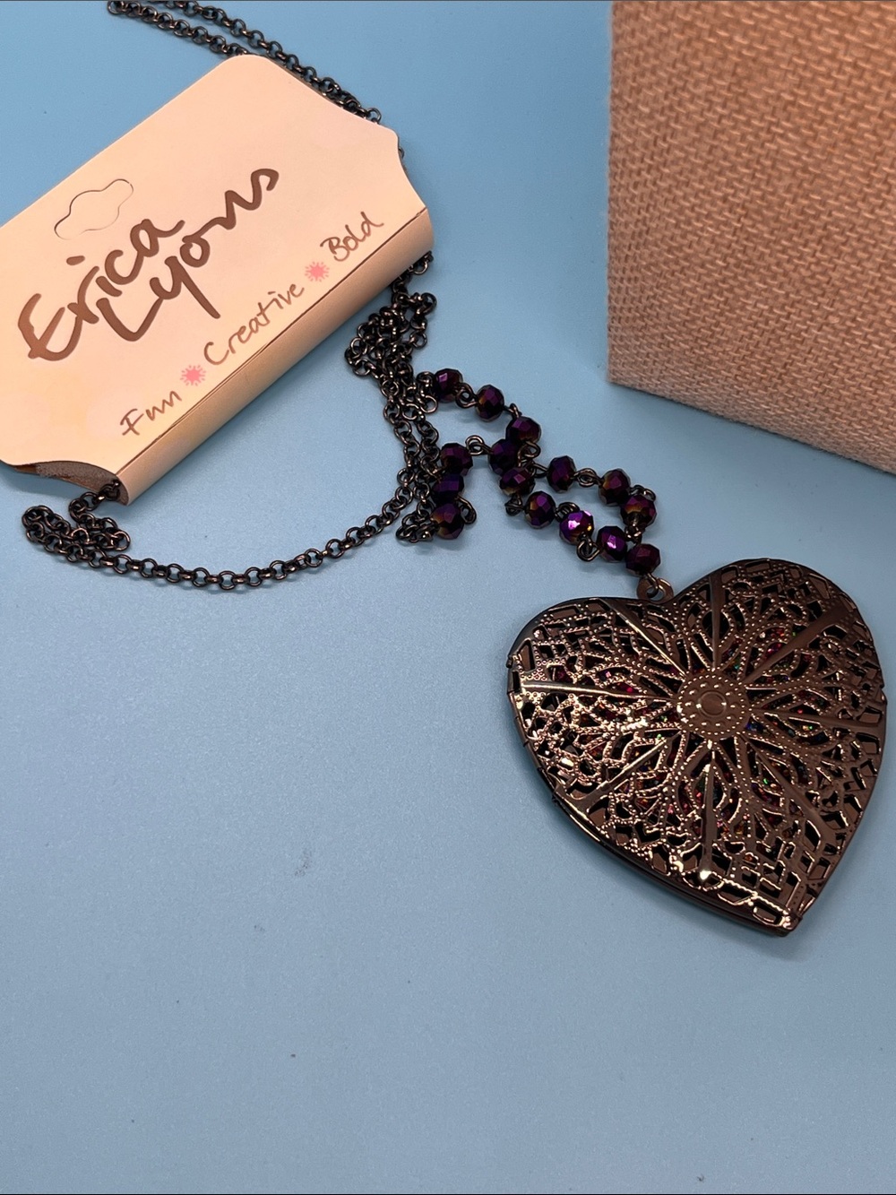 #0017.   Erica Lyons Gunmetal Filigree Heart locket Necklace with Purple Beads